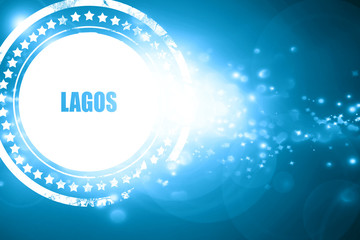 Blue stamp on a glittering background: lagos