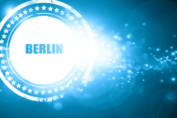 Blue stamp on a glittering background: berlin