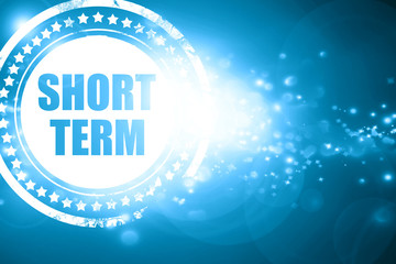 Blue stamp on a glittering background: short term