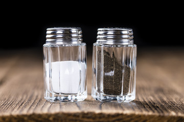 Salt and Pepper Shaker on wooden background