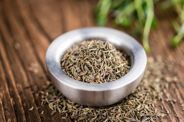 Dried Thyme on wooden background