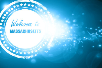 Blue stamp on a glittering background: Welcome to masschusetts