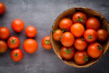 Fototapeta na wymiar Tomato on the gray background.