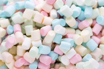 Background or texture of colorful mini marshmallows.