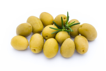 Olives on leaves isolated on white.