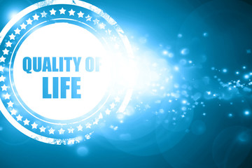 Blue stamp on a glittering background: quality of life