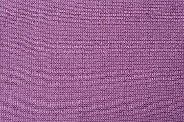 Purple knitted sweater - background.