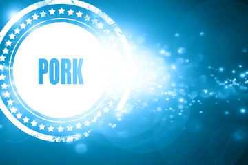 Blue stamp on a glittering background: Delicious pork signs