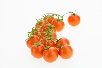 Heap of cherry tomatoes, on white background.