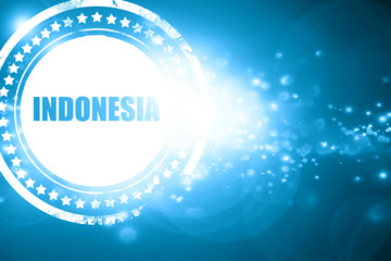 Blue stamp on a glittering background: Greetings from indonesia
