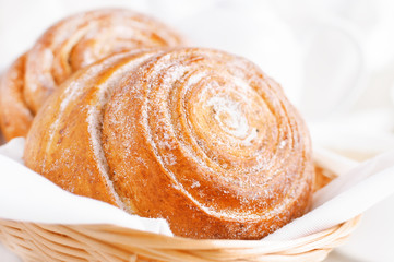 sweet bun with cinnamon in the basket