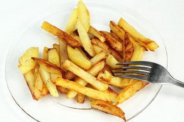 fried potatoes on fork