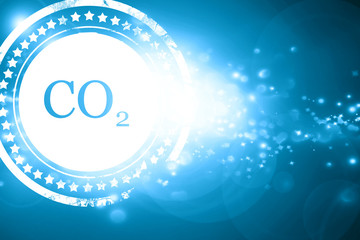 Blue stamp on a glittering background: CO2 warning sign