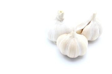 Three garlic on White Background