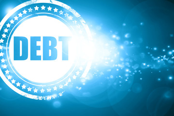 Blue stamp on a glittering background: Debt sign with some smoot