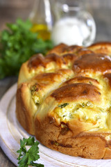 Yeast cake with feta and greens.