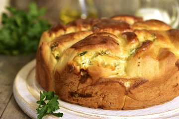 Yeast cake with feta and greens.