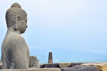 Buddha on the wall of Borobudur, Java, Indonesia