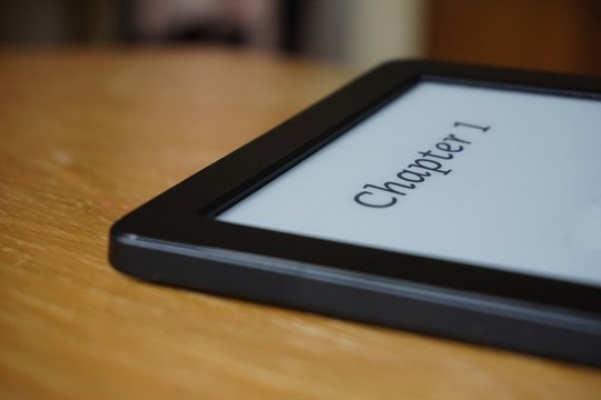 
Electronic reader with a caption Chapter 1 in electronic Ink on the display 