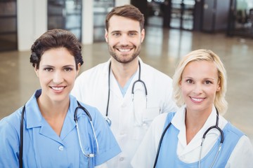 High angle portrait of smiling doctors and nurse