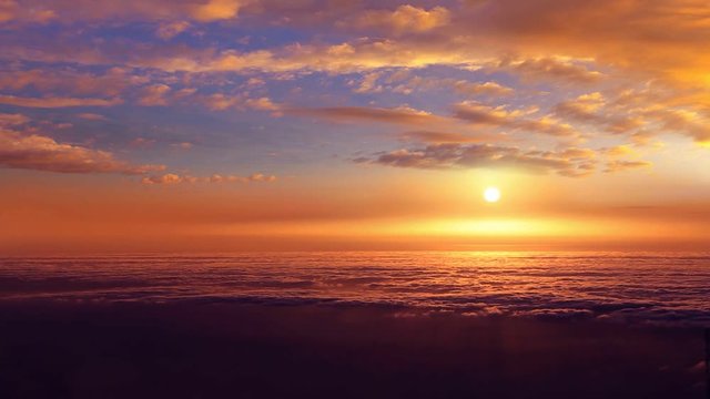 Sea of clouds sunset view over the clouds in canary Islands