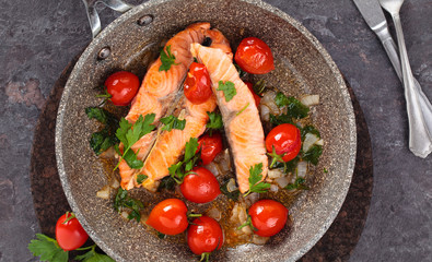 Fried salmon  with vegetables.