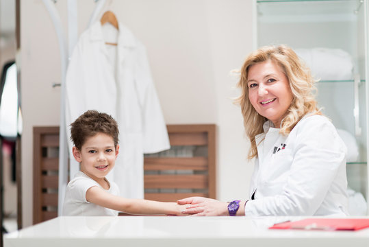 Pediatrician with little boy