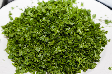 Closeup of chopped parsley with selective focus