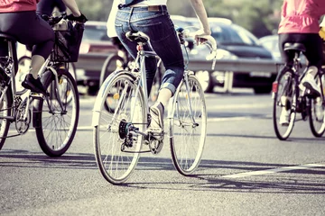 Afwasbaar Fotobehang Fietsen fietsers op straat