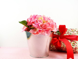gift box and beautiful flowers bouquet with space for copy