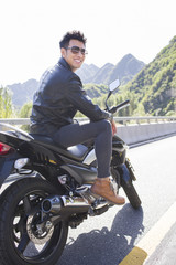 Young man riding motorcycle