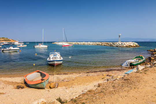 Boats in Bay of Nea Fokia village, Halkidiki, Greece.