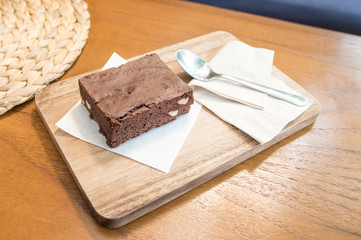 Delicious Chocolate Brownie on wooden tray