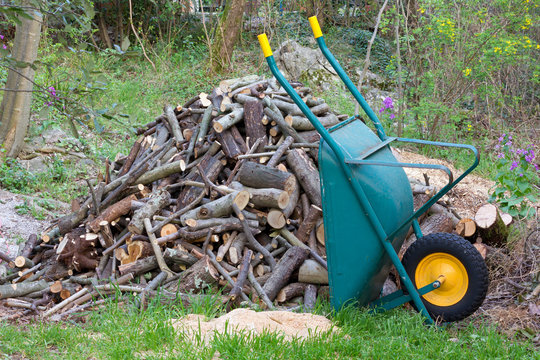 Barrow next to a Woodpile