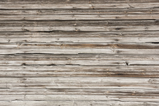 Grunge old weathered brown wood surface.