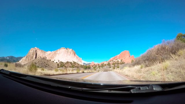 View from the dashboard camera while driving through Garden of the Gods