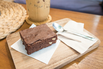 Delicious Chocolate Brownie on wooden tray