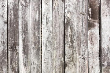 Gray grunge wooden desks background.