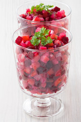 Beetroot salad vinaigrette / Beetroot salad vinaigrette with beetroot, carrot, potato, cucumber in glass
