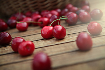 fresh sweet cherries on wooden table