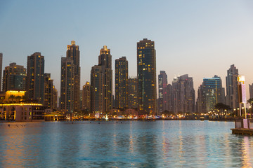 Fototapeta na wymiar Dubai city business district and seafront at night