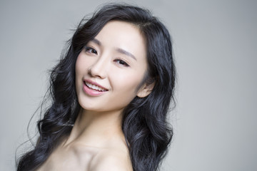 Headshot of young beautiful woman