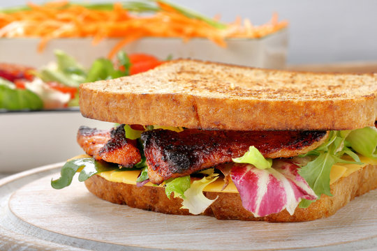 Sandwich with pork cheese and carrots salad
