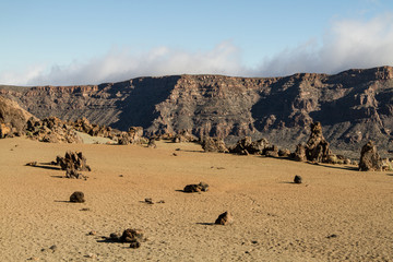 Fototapeta na wymiar Volcanic ladscape with clouds in Teide National Park, Tenerife, Canary Island, Spain