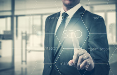 Search optimization business pointing finnger selecting seo