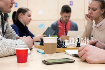 Group of young People at wooden Table Leisure activities