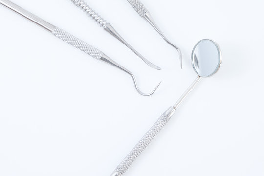 Dental tools on white background