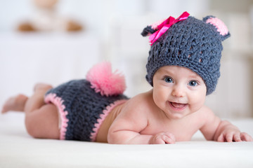 happy baby child in costume a rabbit bunny