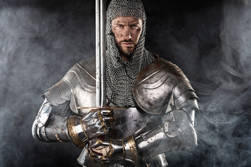 Medieval Warrior with Chain Mail Armour and Sword - obrazy, fototapety, plakaty