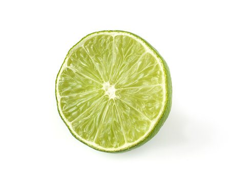 Half of fresh lime isolated on white